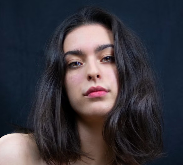 Female archer confident headshot portrait