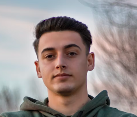 Young male archer outdoors portrait